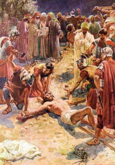 Jesús clavado en la Cruz
